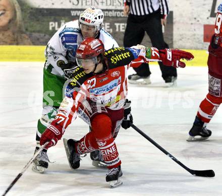 EBEL. Eishockey Bundesliga. KAC gegen  HDD TILIA Olimpija Ljubljana. Hundertpfund Thomas (KAC), MURIC Egon  (Ljubljana). Klagenfurt, am 25.11.2008.
Foto: Nadja Kuess
---
pressefotos, pressefotografie, kuess, qs, qspictures, sport, bild, bilder, bilddatenbank