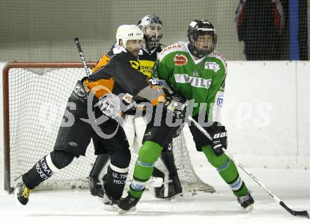 Eishockey. CHL Ost. VST Adler Wild Voelkermarkt gegen USC Velden. Benjamin Reichart (Voelkermarkt), Thomas Steinwender (Velden). Voelkermarkt, 29.11.2008
Foto: Kuess
---
pressefotos, pressefotografie, kuess, qs, qspictures, sport, bild, bilder, bilddatenbank