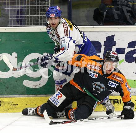 EBEL. Eishockey Bundesliga. EC Pasut VSV gegen Graz 99ers. Nikolas Petrik (VSV), Stefan Herzog (Graz). Villach, am 9.12.2008.
Foto: Nadja Kuess



---
pressefotos, pressefotografie, kuess, qs, qspictures, sport, bild, bilder, bilddatenbank