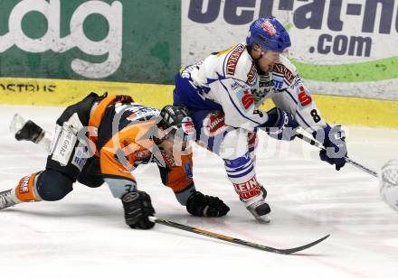 EBEL. Eishockey Bundesliga. EC Pasut VSV gegen Graz 99ers. Roland Kaspitz (VSV), Harry Lange (Graz). Villach, am 9.12.2008.
Foto: Nadja Kuess



---
pressefotos, pressefotografie, kuess, qs, qspictures, sport, bild, bilder, bilddatenbank