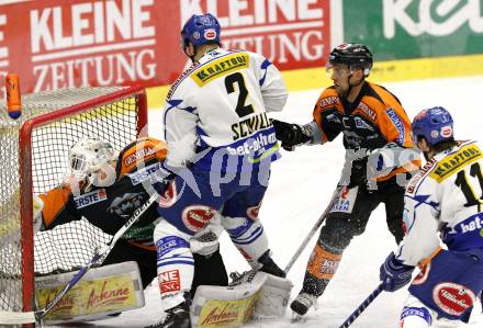 EBEL. Eishockey Bundesliga. EC Pasut VSV gegen Graz 99ers. Darell Scoville (VSV), Dov Grumet-Morris, Michael Stuart (Graz). Villach, am 9.12.2008.
Foto: Nadja Kuess



---
pressefotos, pressefotografie, kuess, qs, qspictures, sport, bild, bilder, bilddatenbank