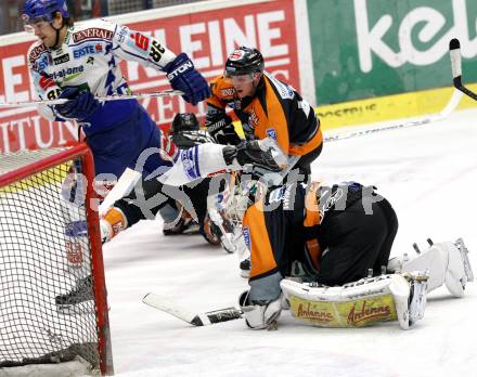 EBEL. Eishockey Bundesliga. EC Pasut VSV gegen Graz 99ers. Jonathan Ferland (VSV), Dov Grumet-Morris (Graz). Villach, am 9.12.2008.
Foto: Nadja Kuess



---
pressefotos, pressefotografie, kuess, qs, qspictures, sport, bild, bilder, bilddatenbank