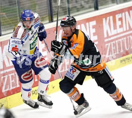 EBEL. Eishockey Bundesliga. EC Pasut VSV gegen Graz 99ers. Benjamin Petrik (VSV), Jamie Mattie (Graz). Villach, am 9.12.2008.
Foto: Nadja Kuess 


---
pressefotos, pressefotografie, kuess, qs, qspictures, sport, bild, bilder, bilddatenbank