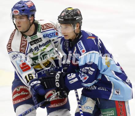 EBEL. Eishockey Bundesliga. EC Pasut VSV gegen Alba Volan Szekesfehervar. Dan Cavanaugh,(VSV),  Daniel Fekete (Szekesfehervar). Villach, am 21.12.2008.
Foto: Kuess 


---
pressefotos, pressefotografie, kuess, qs, qspictures, sport, bild, bilder, bilddatenbank