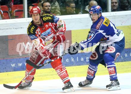 EBEL. Eishockey Bundesliga. KAC gegen VSV. Mike Craig (KAC), Michael Raffl (VSV). Klagenfurt, am 23.12.2008.
Foto: Nadja Kuess 
---
pressefotos, pressefotografie, kuess, qs, qspictures, sport, bild, bilder, bilddatenbank