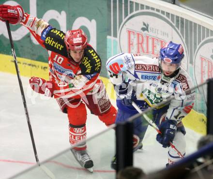 EBEL. Eishockey Bundesliga. EC Pasut VSV gegen EC KAC. MAPLETOFT Justin (VSV), NORRIS Warren (KAC). Villach, am 26.12.2008.
Foto: Nadja Kuess 


---
pressefotos, pressefotografie, kuess, qs, qspictures, sport, bild, bilder, bilddatenbank