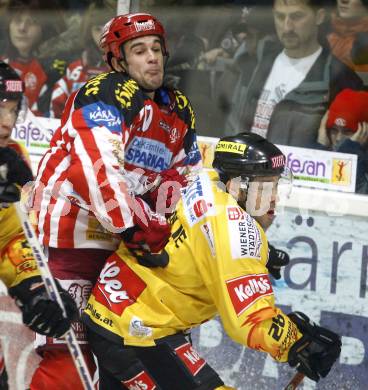 EBEL. Eishockey Bundesliga. KAC gegen EV Vienna Capitals. Warren Norris,  (KAC), Dan Bjornlie (Capitals). Klagenfurt, am 28.12.2008.
Foto: Kuess 

---
pressefotos, pressefotografie, kuess, qs, qspictures, sport, bild, bilder, bilddatenbank