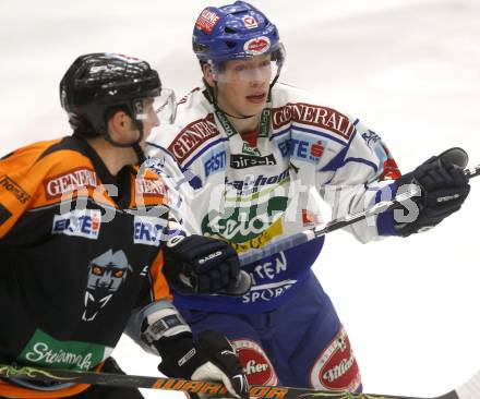 EBEL. Eishockey Bundesliga. EC Pasut VSV gegen EC Graz 99ers. Michael Raffl,  (VSV), Sven Klimbacher (Graz). Villach, am 30.12.2008.
Foto: Kuess 


---
pressefotos, pressefotografie, kuess, qs, qspictures, sport, bild, bilder, bilddatenbank