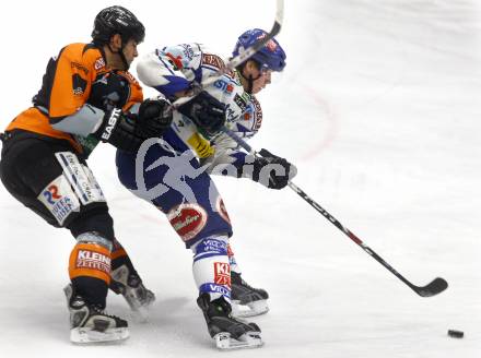 EBEL. Eishockey Bundesliga. EC Pasut VSV gegen EC Graz 99ers. Michael Raffl, (VSV), Anthony Iob (Graz). Villach, am 30.12.2008.
Foto: Kuess 


---
pressefotos, pressefotografie, kuess, qs, qspictures, sport, bild, bilder, bilddatenbank