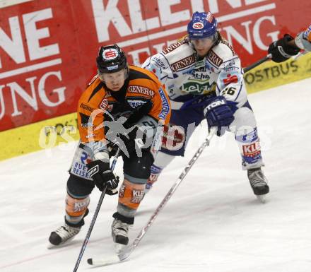 EBEL. Eishockey Bundesliga. EC Pasut VSV gegen EC Graz 99ers. Christof Martinz, (VSV), Troy Riddle  (Graz). Villach, am 30.12.2008.
Foto: Kuess 


---
pressefotos, pressefotografie, kuess, qs, qspictures, sport, bild, bilder, bilddatenbank