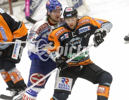 EBEL. Eishockey Bundesliga. EC Pasut VSV gegen EC Graz 99ers. Jonathan Ferland, (VSV), Michael Stuart  (Graz). Villach, am 30.12.2008.
Foto: Kuess 


---
pressefotos, pressefotografie, kuess, qs, qspictures, sport, bild, bilder, bilddatenbank