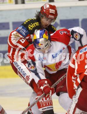 EBEL. Eishockey Bundesliga. EC KAC gegen EC RED BULL SALZBURG. Christoph Harand, (KAC), Walter Lee Sweatt  (Salzburg). Klagenfurt, am 2.1.2009.
Foto: Kuess 

---
pressefotos, pressefotografie, kuess, qs, qspictures, sport, bild, bilder, bilddatenbank