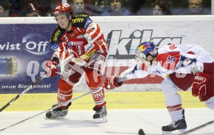 EBEL. Eishockey Bundesliga. EC KAC gegen EC RED BULL SALZBURG. Kirk Furey (KAC), Manuel Latusa (Salzburg). Klagenfurt, am 2.1.2009.
Foto: Kuess 

---
pressefotos, pressefotografie, kuess, qs, qspictures, sport, bild, bilder, bilddatenbank