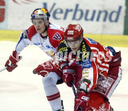 EBEL. Eishockey Bundesliga. EC KAC gegen EC RED BULL SALZBURG. Stefan Geier (KAC), Oskars Cibulski (Salzburg). Klagenfurt, am 2.1.2009.
Foto: Kuess 

---
pressefotos, pressefotografie, kuess, qs, qspictures, sport, bild, bilder, bilddatenbank