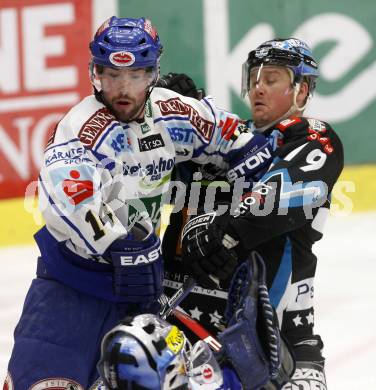 EBEL. Eishockey Bundesliga. EC Pasut VSV gegen EHC LIWEST Linz. Justin Mapletoft, (VSV),  Rob Shearer (Linz). Villach, am 6.1.2009.
Foto: Kuess 


---
pressefotos, pressefotografie, kuess, qs, qspictures, sport, bild, bilder, bilddatenbank