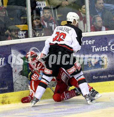 EBEL. Eishockey Bundesliga. KAC gegen HK Acroni Jesenice. SCHELLANDER Paul (KAC), KOVACEVIC Sabahudin (Jesenice). Klagenfurt, am 6.1.2009.
Foto: Kuess 

---
pressefotos, pressefotografie, kuess, qs, qspictures, sport, bild, bilder, bilddatenbank