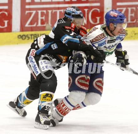 EBEL. Eishockey Bundesliga. EC Pasut VSV gegen EHC LIWEST Linz. Robby Sandrock, (VSV), Robert Lukas (Linz). Villach, am 6.1.2009.
Foto: Kuess 


---
pressefotos, pressefotografie, kuess, qs, qspictures, sport, bild, bilder, bilddatenbank