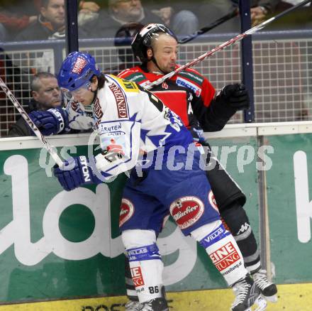 EBEL. Eishockey Bundesliga. EC Pasut VSV gegen HC TWK INNSBRUCK, DIE HAIE. Jonathan Ferland, (VSV), Gerhard Unterluggauer  (Innsbruck). Villach, am 9.1.2009.
Foto: Kuess 


---
pressefotos, pressefotografie, kuess, qs, qspictures, sport, bild, bilder, bilddatenbank