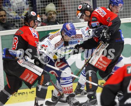 EBEL. Eishockey Bundesliga. EC Pasut VSV gegen HC TWK INNSBRUCK, DIE HAIE. Markus peintner, (VSV),  Alan Letang, Philippe Lakos (Innsbruck). Villach, am 9.1.2009.
Foto: Kuess 


---
pressefotos, pressefotografie, kuess, qs, qspictures, sport, bild, bilder, bilddatenbank