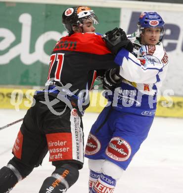 EBEL. Eishockey Bundesliga. EC Pasut VSV gegen HC TWK INNSBRUCK, DIE HAIE. Benoit Mondou, (VSV), Patrik Vogl (Innsbruck). Villach, am 9.1.2009.
Foto: Kuess 


---
pressefotos, pressefotografie, kuess, qs, qspictures, sport, bild, bilder, bilddatenbank