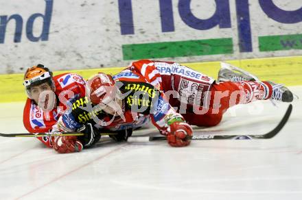 EBEL. Eishockey Bundesliga. KAC gegen HC TWK Innsbruck. SCHULLER David (KAC), BELLISSIMO Vincent (Innsbruck). Klagenfurt, am 16.1.2009.
Foto: Kuess 

---
pressefotos, pressefotografie, kuess, qs, qspictures, sport, bild, bilder, bilddatenbank