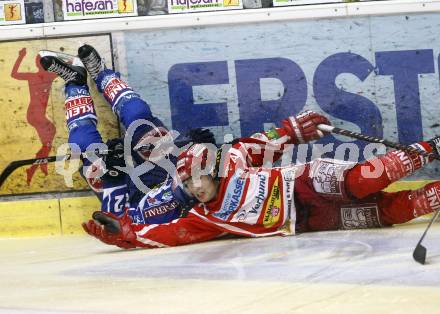 EBEL. Eishockey Bundesliga. EC KAC gegen EC VSV. Herbert Ratz, (KAC), Michael Raffl (VSV). Klagenfurt, am 23.1.2009.
Foto: Kuess 

---
pressefotos, pressefotografie, kuess, qs, qspictures, sport, bild, bilder, bilddatenbank