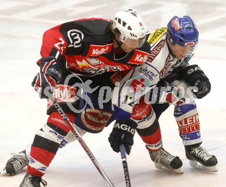 EBEL. Eishockey Bundesliga. EC Pasut VSV gegen HK Acroni Jesenice.  Michael Raffl, (VSV), Anze Terlikar (Jesenice). Villach, am 27.1.2009.
Foto: Kuess 


---
pressefotos, pressefotografie, kuess, qs, qspictures, sport, bild, bilder, bilddatenbank