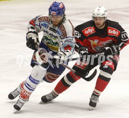 EBEL. Eishockey Bundesliga. EC Pasut VSV gegen HK Acroni Jesenice. Thomas Raffl (VSV), Tomo Hafner (Jesenice). Villach, am 27.1.2009.
Foto: Kuess 


---
pressefotos, pressefotografie, kuess, qs, qspictures, sport, bild, bilder, bilddatenbank