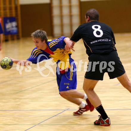 Handball Bundesliga. SVVW gegen HCK 59.  GODEC Stefan (SVVW), PRAEPROST Anton (HCK). Klagenfurt, 7.2.2009
Foto:  Kuess

---
pressefotos, pressefotografie, kuess, qs, qspictures, sport, bild, bilder, bilddatenbank