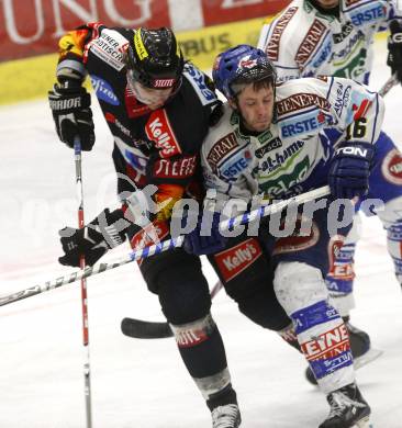 EBEL. Eishockey Bundesliga. EC Pasut VSV gegen EV VIENNA CAPITALS.  Dan Cavanaugh, (VSV), Douglas Lynch (Vienna). Villach, am 13.2.2009.
Foto: Kuess 


---
pressefotos, pressefotografie, kuess, qs, qspictures, sport, bild, bilder, bilddatenbank