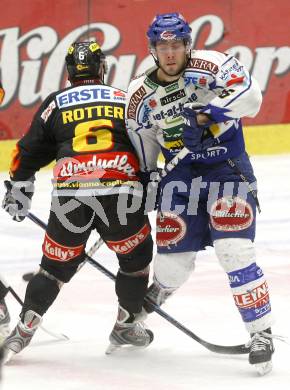 EBEL. Eishockey Bundesliga. EC Pasut VSV gegen EV VIENNA CAPITALS.  Dan Cavanaugh, (VSV), Rafael Rotter (Vienna). Villach, am 13.2.2009.
Foto: Kuess 


---
pressefotos, pressefotografie, kuess, qs, qspictures, sport, bild, bilder, bilddatenbank