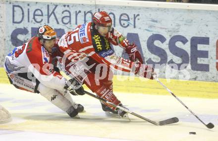 EBEL. Eishockey Bundesliga. KAC gegen HC TWK Innsbruck, Die Haie.  Paul Schellander, (KAC),  Vincent Bellissimo (Innsbruck). Klagenfurt, am 17.2.2009.
Foto: Kuess 

---
pressefotos, pressefotografie, kuess, qs, qspictures, sport, bild, bilder, bilddatenbank