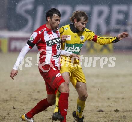 Fussball. Tipp3-Bundesliga. SK Austria Kelag Kaernten  gegen KSV Superfund. Manuel Weber, (Austria Kaernten), Srdan Pavlov (KSV). Kapfenberg, 21.2.2009. 
Foto: Kuess

---
pressefotos, pressefotografie, kuess, qs, qspictures, sport, bild, bilder, bilddatenbank