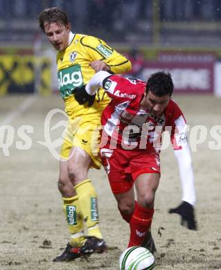 Fussball. Tipp3-Bundesliga. SK Austria Kelag Kaernten  gegen KSV Superfund. Thomas Riedl, (Austria Kaernten),  Robert Schellander (KSV). Kapfenberg, 21.2.2009. 
Foto: Kuess

---
pressefotos, pressefotografie, kuess, qs, qspictures, sport, bild, bilder, bilddatenbank