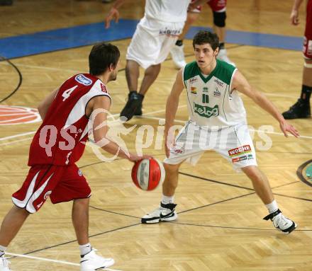 Basketball Bundesliga. Woerthersee Piraten gegen WBCKraftwerk Wels. Jack Leasure  (Piraten), Armin Woschank (Wels).  Klagenfurt, 21.2.2009.
Foto: Kuess

---
pressefotos, pressefotografie, kuess, qs, qspictures, sport, bild, bilder, bilddatenbank