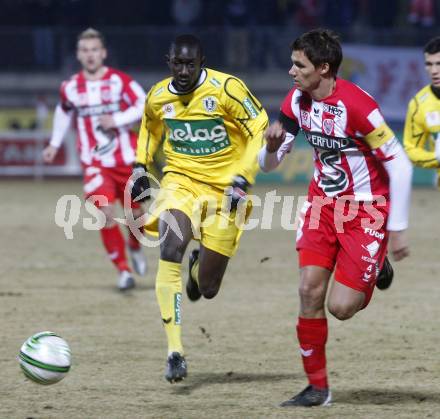 Fussball. Tipp3-Bundesliga. SK Austria Kelag Kaernten  gegen KSV Superfund. Modou Jagne, (Austria Kaernten), Dominique Taboga (KSV). Kapfenberg, 21.2.2009. 
Foto: Kuess

---
pressefotos, pressefotografie, kuess, qs, qspictures, sport, bild, bilder, bilddatenbank