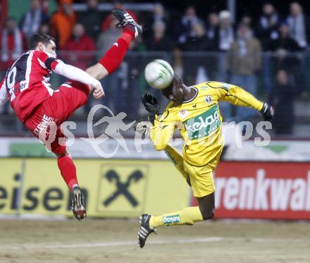 Fussball. Tipp3-Bundesliga. SK Austria Kelag Kaernten  gegen KSV Superfund. Modou Jagne, (Austria Kaernten), Thomas Schoenberger (KSV). Kapfenberg, 21.2.2009. 
Foto: Kuess

---
pressefotos, pressefotografie, kuess, qs, qspictures, sport, bild, bilder, bilddatenbank