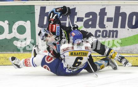 EBEL. Eishockey Bundesliga. EC Pasut VSV gegen EHC LIWEST Linz. Robby Sandrock  (VSV), Petri Liimatainen (Linz). Villach, am 22.2.2009.
Foto: Kuess 


---
pressefotos, pressefotografie, kuess, qs, qspictures, sport, bild, bilder, bilddatenbank