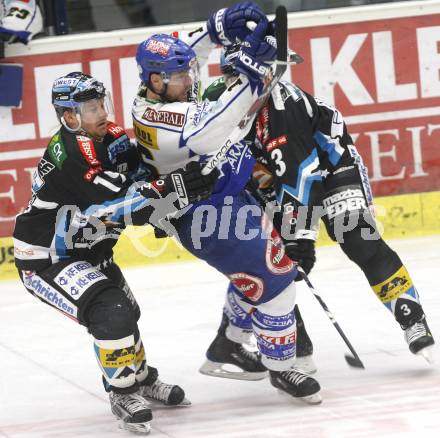 EBEL. Eishockey Bundesliga. EC Pasut VSV gegen EHC LIWEST Linz. Dan Cavanaugh  (VSV), Robert Shearer, Ray Dilauro (Linz). Villach, am 22.2.2009.
Foto: Kuess 


---
pressefotos, pressefotografie, kuess, qs, qspictures, sport, bild, bilder, bilddatenbank