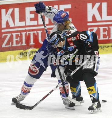 EBEL. Eishockey Bundesliga. EC Pasut VSV gegen EHC LIWEST Linz. Martin Oraze (VSV), Patrick Maier (Linz). Villach, am 22.2.2009.
Foto: Kuess 


---
pressefotos, pressefotografie, kuess, qs, qspictures, sport, bild, bilder, bilddatenbank