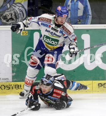 EBEL. Eishockey Bundesliga. EC Pasut VSV gegen EHC LIWEST Linz. 
Robby Sandrock,  (VSV), Martin Grabher Meier (Linz). Villach, am 26.2.2009.
Foto: Kuess 


---
pressefotos, pressefotografie, kuess, qs, qspictures, sport, bild, bilder, bilddatenbank