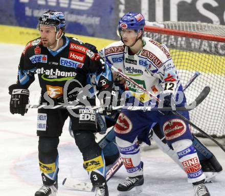 EBEL. Eishockey Bundesliga. EC Pasut VSV gegen EHC LIWEST Linz. Michael Raffl,  (VSV), Ray Dilauro (Linz). Villach, am 26.2.2009.
Foto: Kuess 


---
pressefotos, pressefotografie, kuess, qs, qspictures, sport, bild, bilder, bilddatenbank