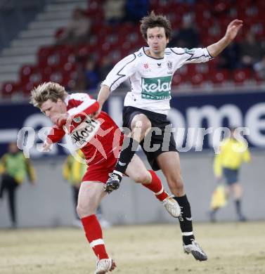 Fussball. Tipp3-Bundesliga. SK Austria Kelag Kaernten  gegen SV Mattersburg. Wolfgang Bubenik, (Austria Kaernten), Michael Moerz (Mattersburg). Klagenfurt, 28.2.2009. 
Foto: Kuess

---
pressefotos, pressefotografie, kuess, qs, qspictures, sport, bild, bilder, bilddatenbank