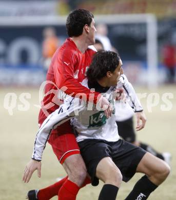 Fussball. Tipp3-Bundesliga. SK Austria Kelag Kaernten  gegen SV Mattersburg. Atdhe Nuhiu,  (Austria Kaernten), Nedeljko Malic (Mattersburg). Klagenfurt, 28.2.2009. 
Foto: Kuess

---
pressefotos, pressefotografie, kuess, qs, qspictures, sport, bild, bilder, bilddatenbank