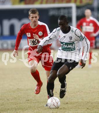 Fussball. Tipp3-Bundesliga. SK Austria Kelag Kaernten  gegen SV Mattersburg. Modou Jagne, (Austria Kaernten), Domenik Doleschal(Mattersburg). Klagenfurt, 28.2.2009. 
Foto: Kuess

---
pressefotos, pressefotografie, kuess, qs, qspictures, sport, bild, bilder, bilddatenbank