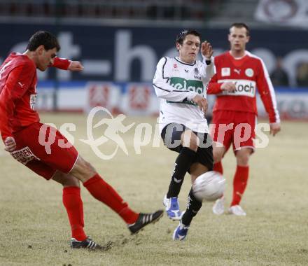 Fussball. Tipp3-Bundesliga. SK Austria Kelag Kaernten  gegen SV Mattersburg. Zlatko Junuzovic, (Austria Kaernten), Nedeljko Malic (Mattersburg). Klagenfurt, 28.2.2009. 
Foto: Kuess

---
pressefotos, pressefotografie, kuess, qs, qspictures, sport, bild, bilder, bilddatenbank