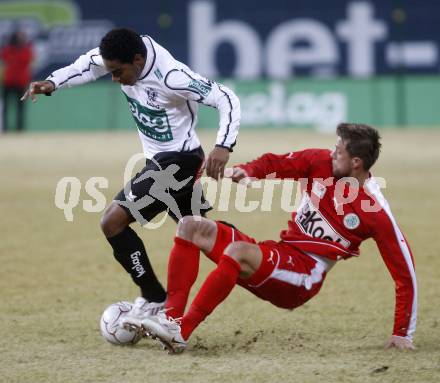 Fussball. Tipp3-Bundesliga. SK Austria Kelag Kaernten  gegen SV Mattersburg. Sandro Jose Da Silva, (Austria Kaernten), Adnan Mravac (Mattersburg). Klagenfurt, 28.2.2009. 
Foto: Kuess

---
pressefotos, pressefotografie, kuess, qs, qspictures, sport, bild, bilder, bilddatenbank