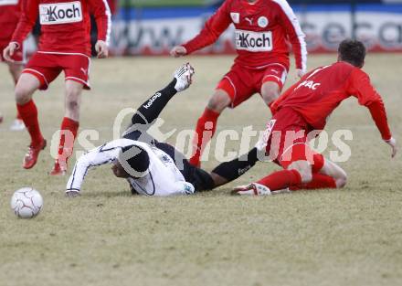 Fussball. Tipp3-Bundesliga. SK Austria Kelag Kaernten  gegen SV Mattersburg. Sandro Jose Da Silva, (Austria Kaernten), Adnan Mravac (Mattersburg). Klagenfurt, 28.2.2009. 
Foto: Kuess

---
pressefotos, pressefotografie, kuess, qs, qspictures, sport, bild, bilder, bilddatenbank