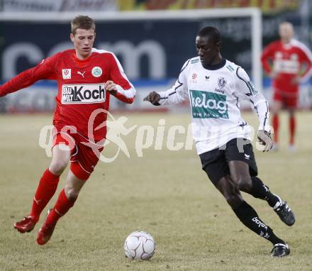 Fussball. Tipp3-Bundesliga. SK Austria Kelag Kaernten  gegen SV Mattersburg. Modou Jagne, (Austria Kaernten), Domenik Doleschal(Mattersburg). Klagenfurt, 28.2.2009. 
Foto: Kuess

---
pressefotos, pressefotografie, kuess, qs, qspictures, sport, bild, bilder, bilddatenbank