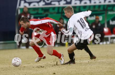 Fussball. Tipp3-Bundesliga. SK Austria Kelag Kaernten  gegen SV Mattersburg. Thomas Hinum, (Austria Kaernten), Ostoja Stjpanovic (Mattersburg). Klagenfurt, 28.2.2009. 
Foto: Kuess

---
pressefotos, pressefotografie, kuess, qs, qspictures, sport, bild, bilder, bilddatenbank